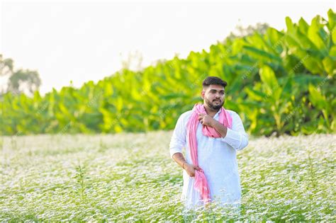 Premium Photo | Indian happy farmer harvesting coriander flowers ...