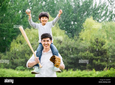 Father And Son Playing Baseball Stock Photo Alamy