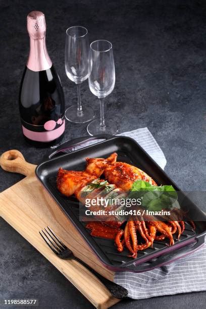 Marinated Grilled Calamari Photos and Premium High Res Pictures - Getty ...