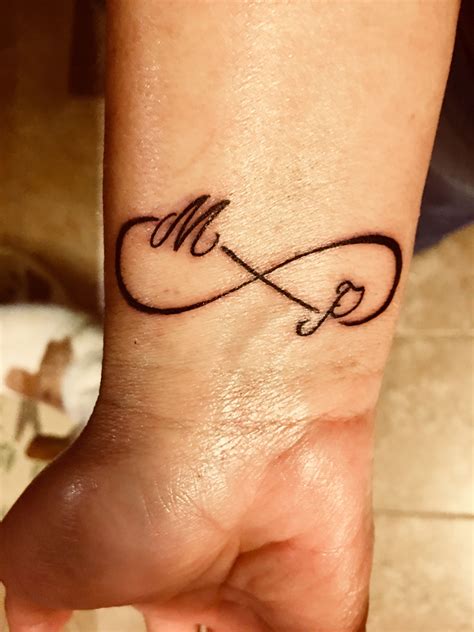 Infinity Symbol Tattoo With Initials