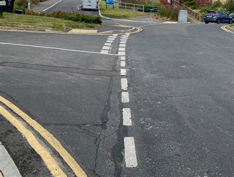 Calls for road restoration at brand new housing development – Brighton