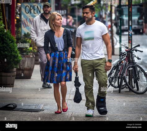 Kelly Ripa And Mark Consuelos Were All Smiles In Spite Of Wet Weather