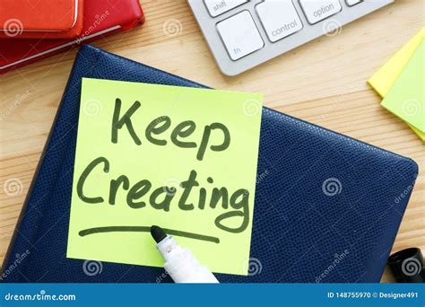 Keep Creating Handwritten On A Memo Inspiration Quote Stock Photo