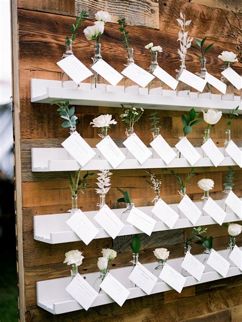 Rustic Place Card Display With Shelves And Flowers