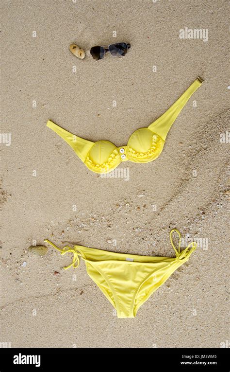 Flat Yellow Bikini On The Beach Stock Photo Alamy