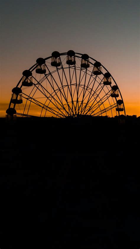 Ferris Wheel At Sunset