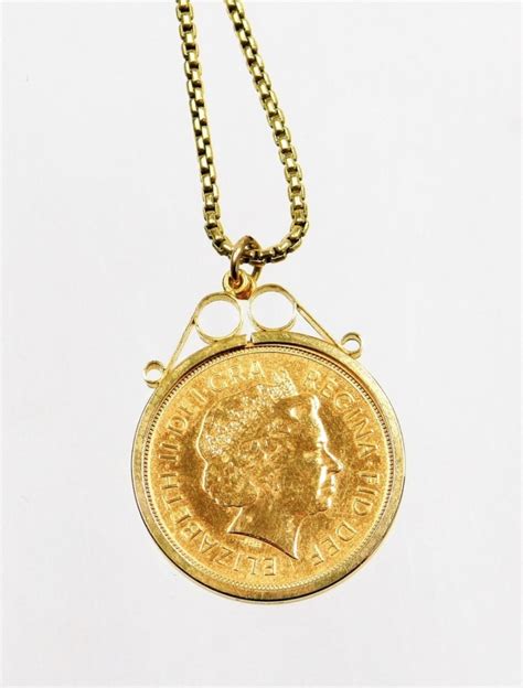 An Elizabeth Ii Full Gold Sovereign Pendant And Chain The Sovereign