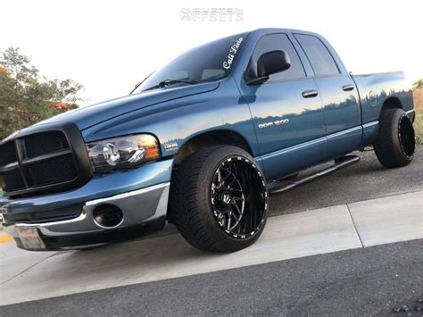 2004 Dodge Ram 1500 With 22x14 76 Tis 544bm And 305 40r22 Atturo Az800 And Level 2 Drop Rear