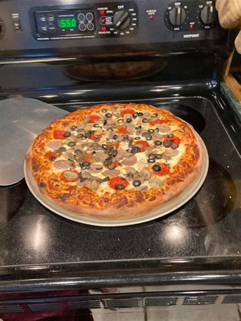 Homemade Pepperoni Sausage Mushroom And Black Olive Pizza Food