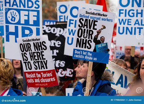 Protesters With Placards At The Save Our NHS Protest Demonstration