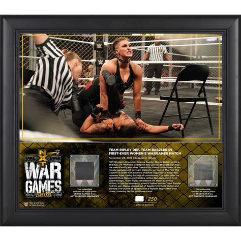 Nxt Wwe Framed 15 X 17 Nxt Takeover Wargames Match Collage With A Piece Of Match Used Canvas