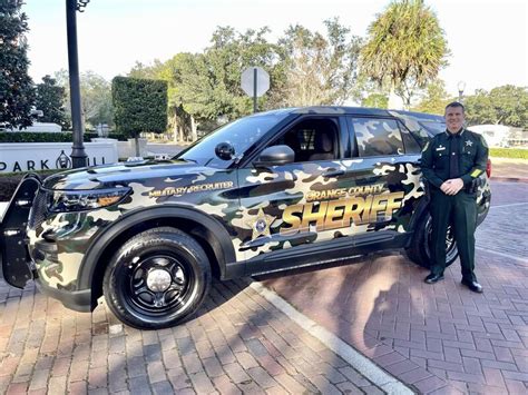 Sheriff John W. Mina with our new military recruitment vehicle