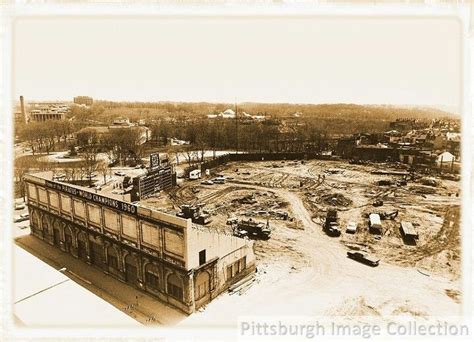 an aerial view of a building under construction in the middle of winter ...