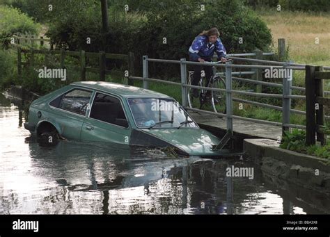 Car stuck in flooded ford at Trescott near Wolverhampton 17 8 94 Stock ...