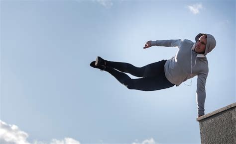 Free Photo Portrait Of Sportive Man Doing Parkour