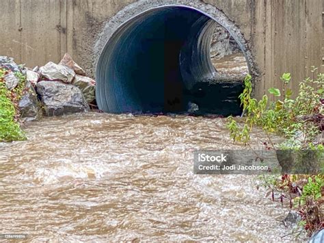 Extreme Flooding Through Storm Drain Stock Photo - Download Image Now ...