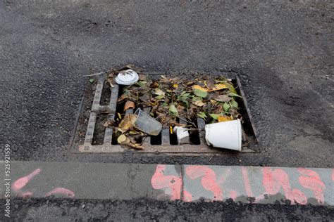 Trash Blocking Storm Drain Gutter Graffiti Stock Photo Adobe Stock