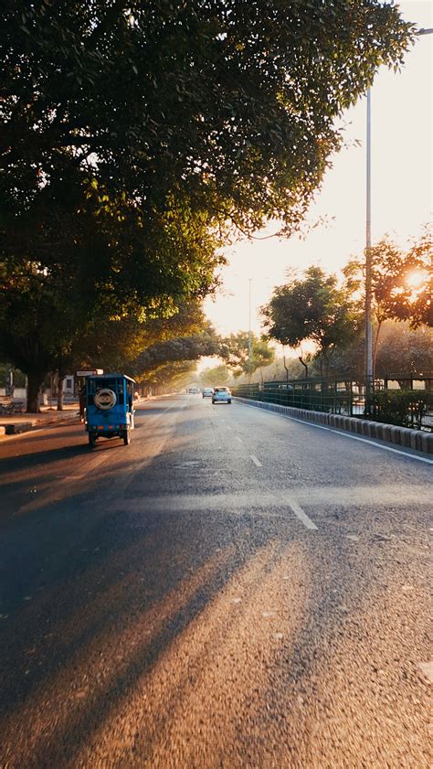 Cars Driving Highway on Sunset · Free Stock Photo