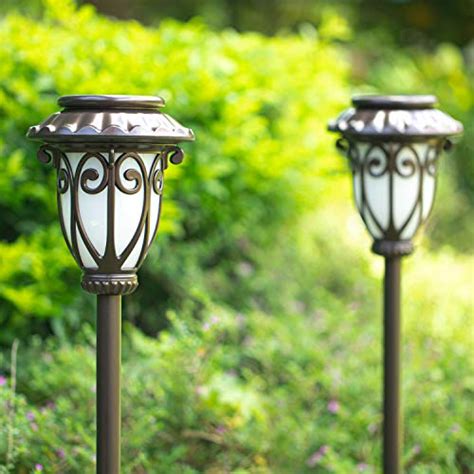 Camabel 56 Tall Solar Torch Lights 4 Pack With Flicking Flame 100 Me Beautiful Gardener