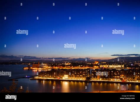 Oslo night cityscape as viewed from the Ekeberg hill, Norway ...