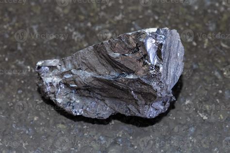 rough Anthracite coal on dark background 13037702 Stock Photo at Vecteezy