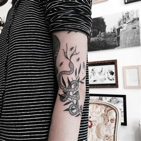 Snake And Tiny Branch Tattoo Tattoogrid Net