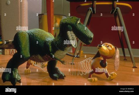 TOY STORY (1995) ANIMATED REX, SLINKY DOG TYSY 030 CREDIT DISNEY Stock ...