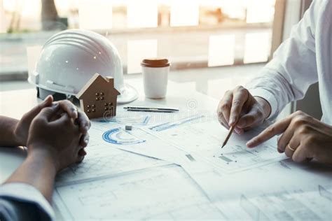 Team Architect Or Engineering People Discussion Working On Table