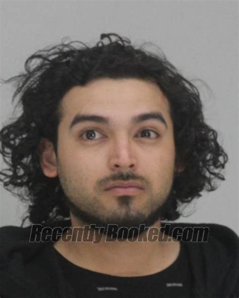 Recent Booking Mugshot For Isaac Flores In Dallas County Texas