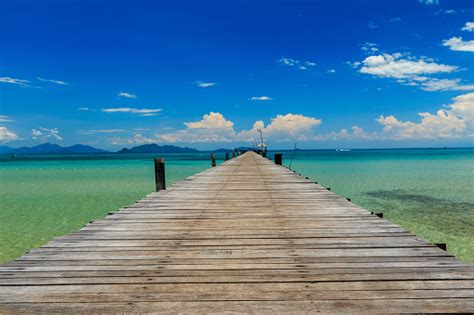 wood bridge   sea stock photo  image  beach blue
