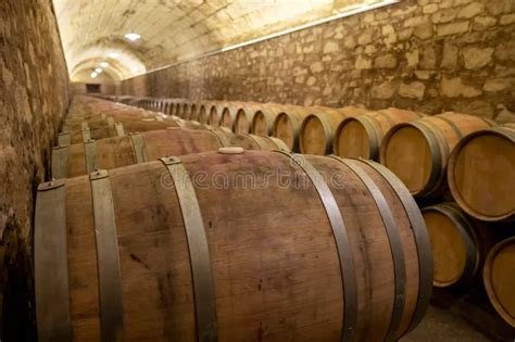 Old French Oak Wooden Barrels In Cellars For Wine Aging Process Wine