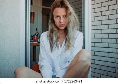 Sexy Tanned Blonde Woman On Balcony Stock Photo Shutterstock
