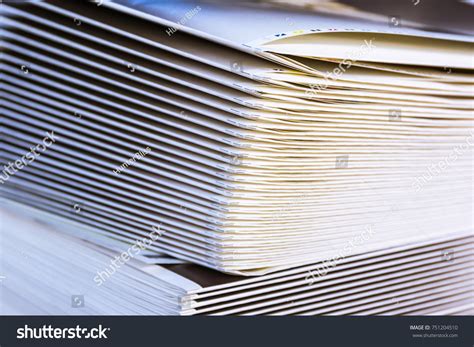 folded stack paper signatures output media stock photo
