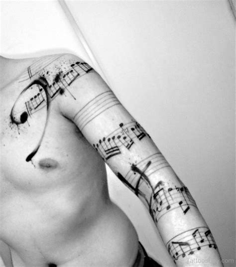 Music Tattoo On Full Sleeve Tattoo Designs Tattoo Pictures