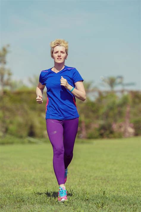 young female runner training for marathon 11928992 Stock Photo at Vecteezy