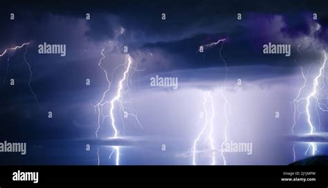 Dark ominous clouds. Thunderstorm with lightning Stock Photo - Alamy