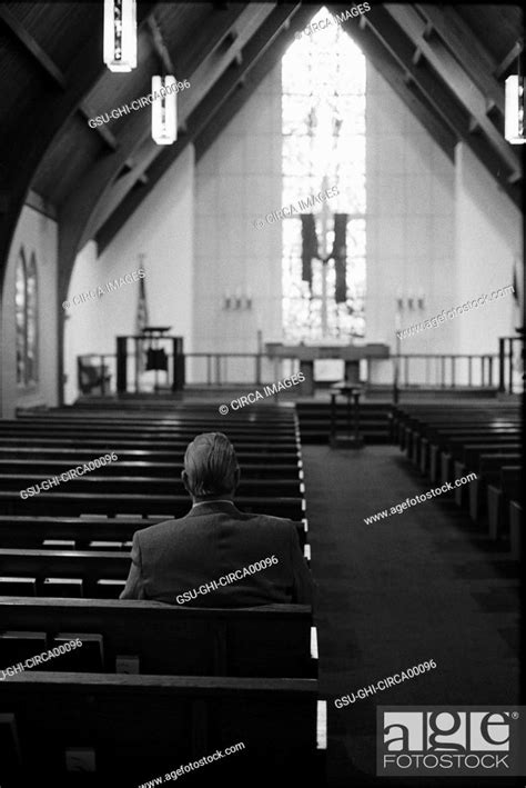 Man Sitting Alone In Church Rear View Stock Photo Picture And Rights