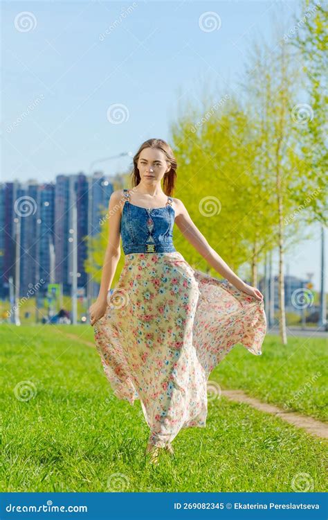 Attractive Happy Young Woman Long Flowered Dress Flying Her Hair Enjoying Free Stock Image