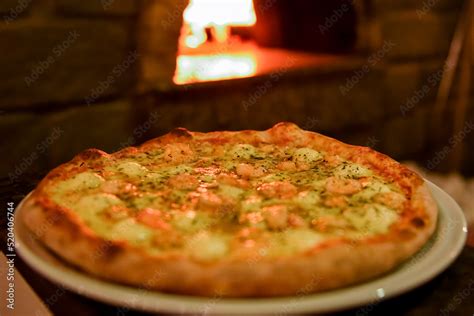 Pizza Assada No Forno A Lenha Stock Photo Adobe Stock