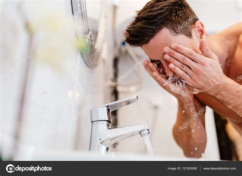 Man Washing Face In Morning Stock Photo Nd