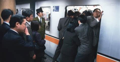 The Subways Are Crowded In Japan So They Hire People To Shove Everyone