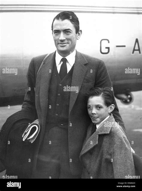 Actor Gregory Peck arriving in London with his son Jonathan Stock Photo ...