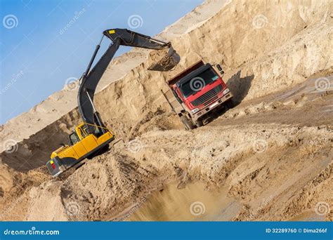 Excavator Loading Dumper Truck Stock Photo Image Of Heavy Equipment