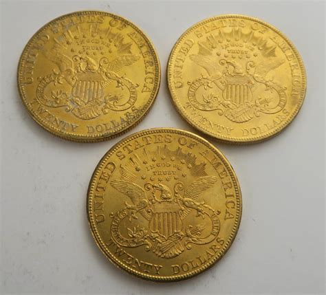 Lot de 3 pièces de 20 dollars or 1904 Frais acheteur 20 TTC au prix