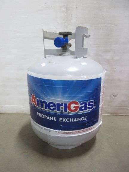 15 lb. propane tank, filled completely, with standard size milk crate ...