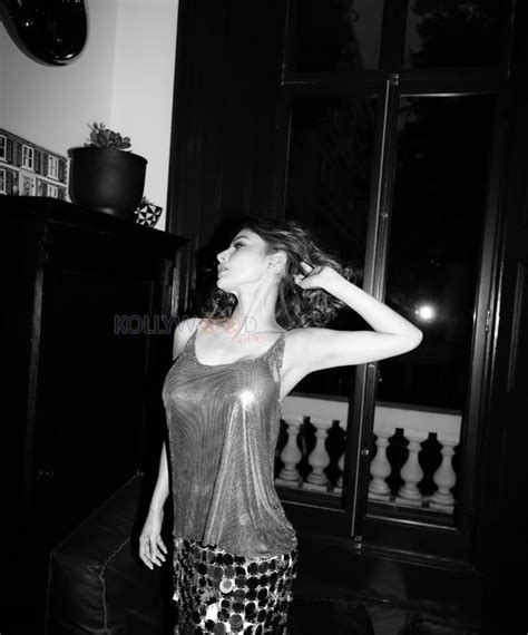 Hot Mouni Roy Topless In A Shimmery Grey Tank Top And Skirt Photos