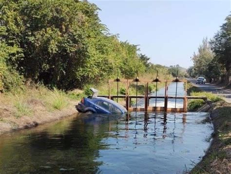 Automovilista Cae A Canal De Riego