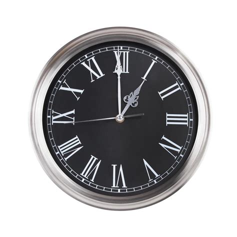 Exactly one hour on round clock 3512689 Stock Photo at Vecteezy