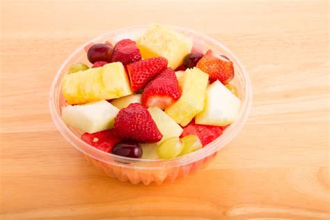 Cut Fresh Fruit In Plastic Bowl Stock Photo - Image: 40990559