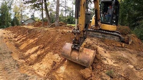 Re Sloping A Failing Drainage Ditch With A Cat Mini Excavator Youtube